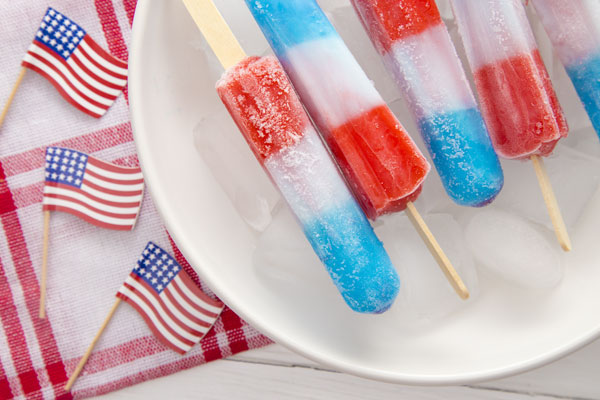 U.S. flags and red, white, and blue popsicles. 