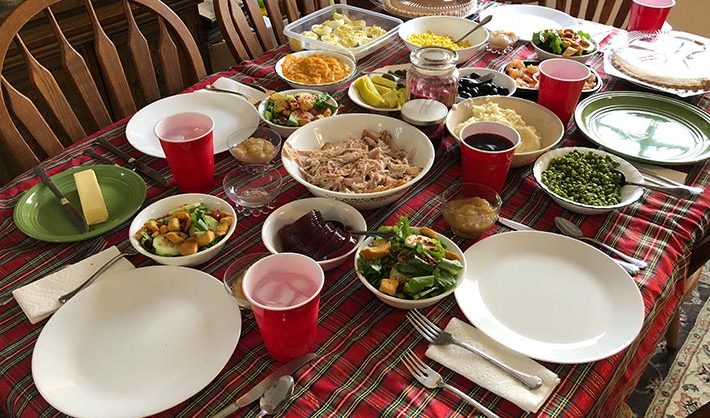 a table set with a Thanksgiving dinner