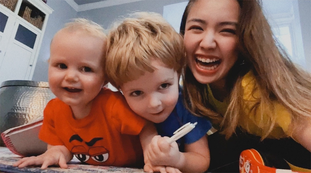 Au pair, Nana, laughs with her host kids.