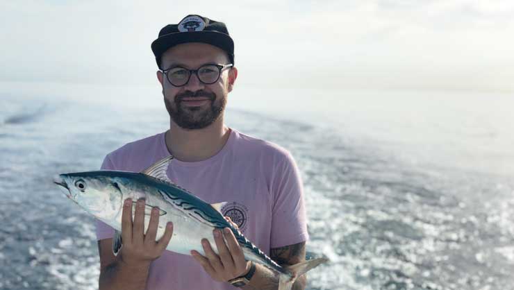 Adriaan deep sea fishing along the coast of Miami.