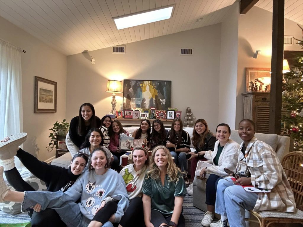 Au Pair USA's Local Coordinator Ann Carr hosts a holiday gift exchange with au pairs in the metro Atlanta area